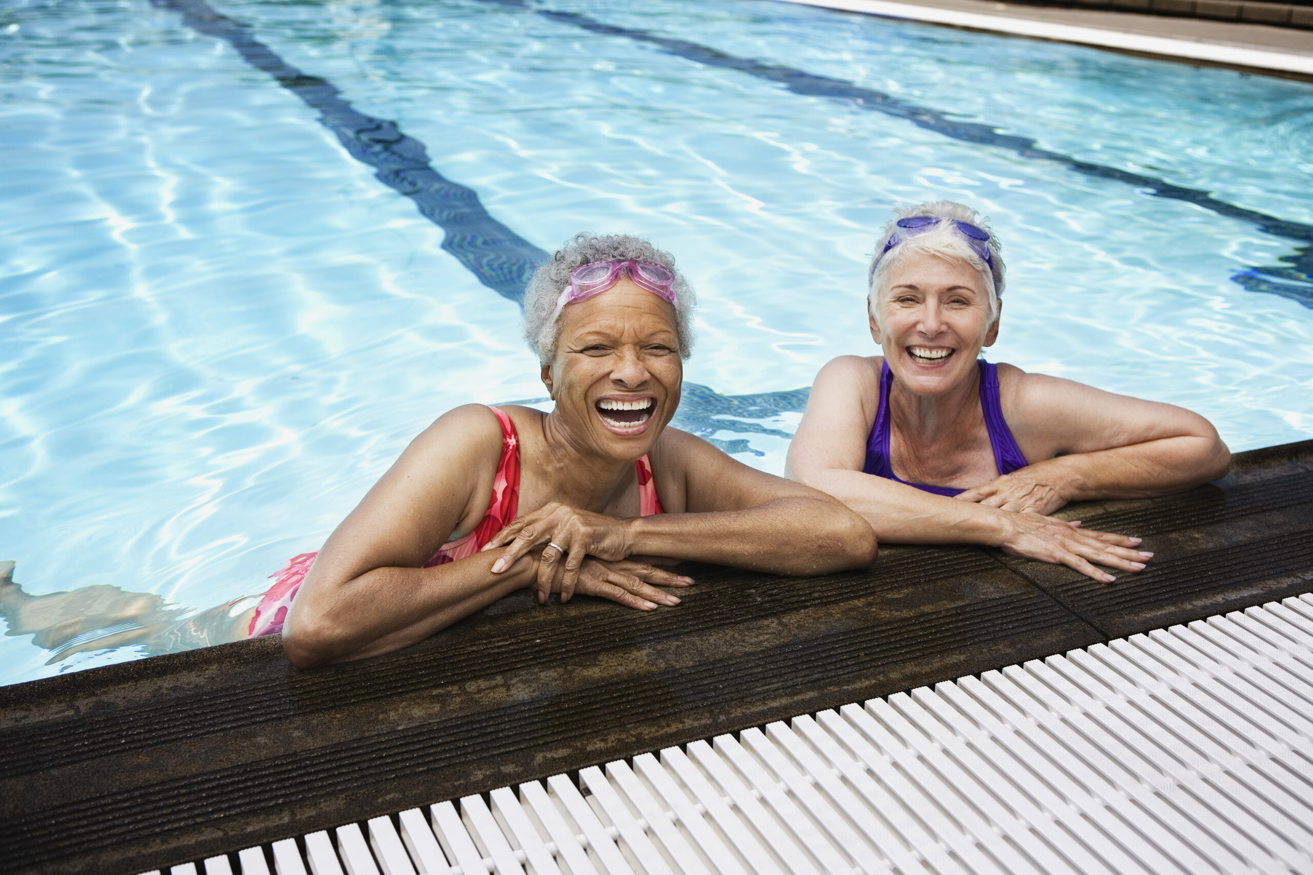 Smiling senior women in pool